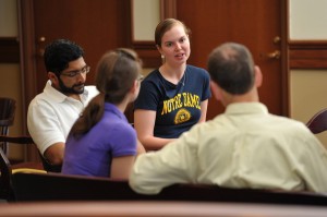 Students and faculty chat in Coleman-Morse