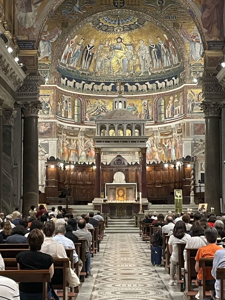 ornate interior of basilica di santa maria in trastevere