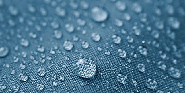 Water beads on rain jacket