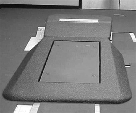 pitching mound with force plate in landing zone for testing

