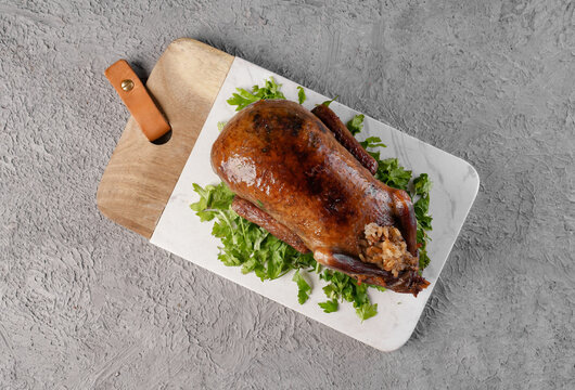 Arabic Cuisine; Egyptian traditional stuffed pigeon or "Hamam Mahshi" dish.  Stock Photo | Adobe Stock